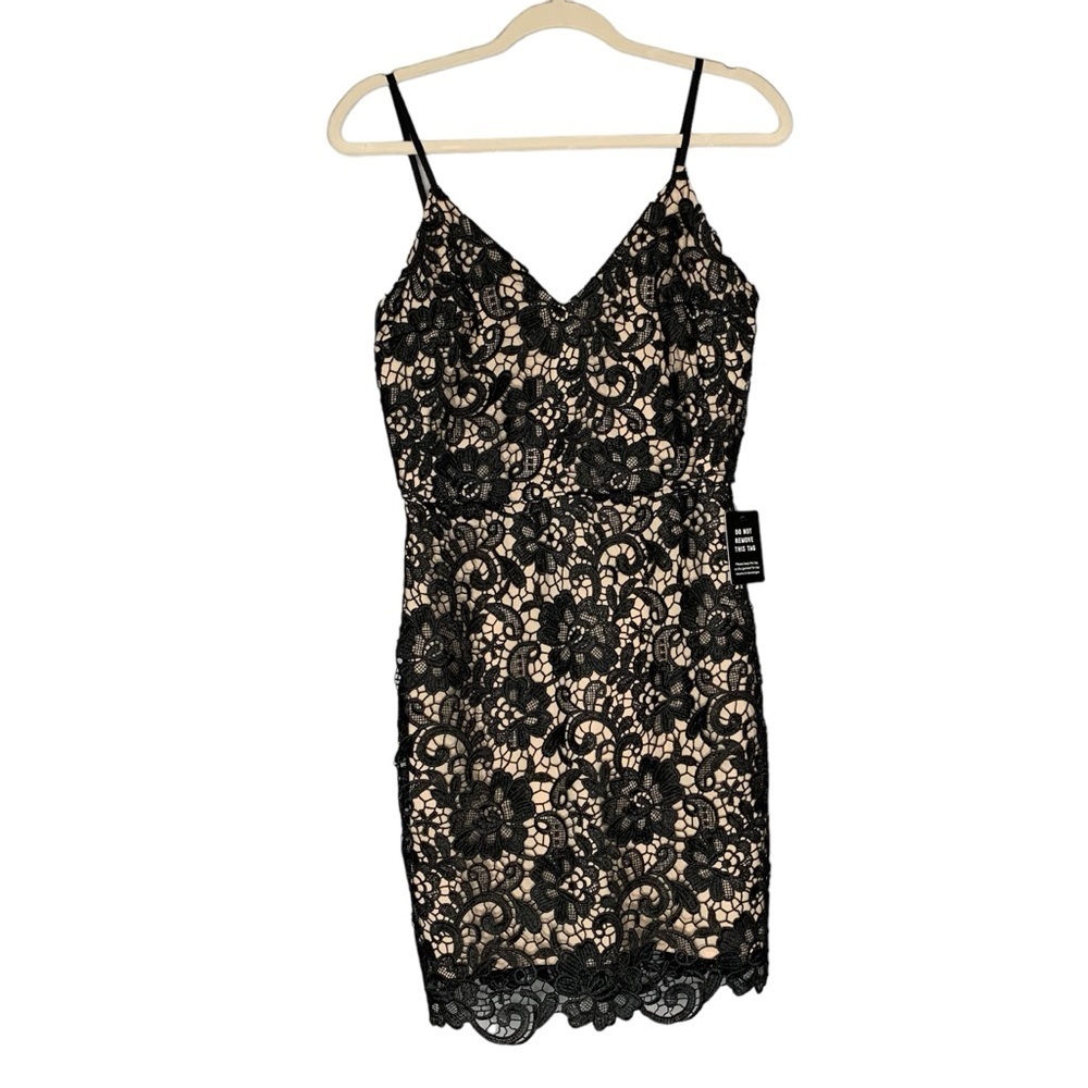Express NWT black crochet lace floral overlay with‎ ribbon satin straps. Size 6